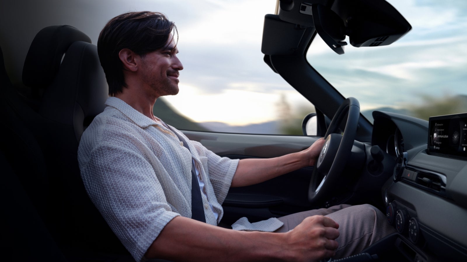 Driver in the 2025 Mazda MX-5 Miata driving around Dover, OH