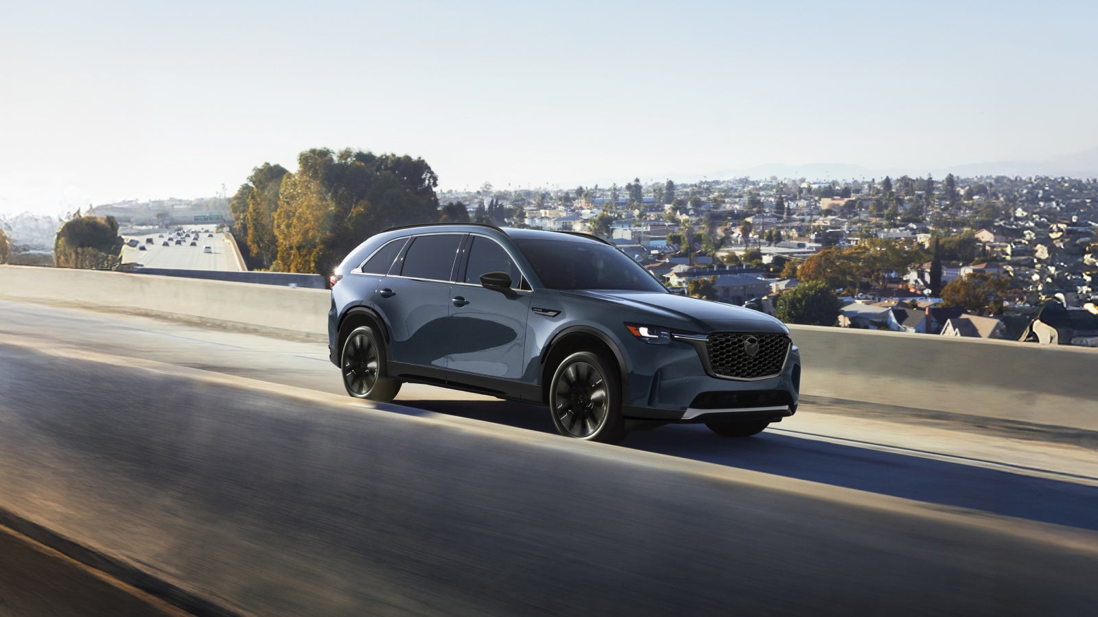 2026 Mazda CX-90 driving in Dover, OH