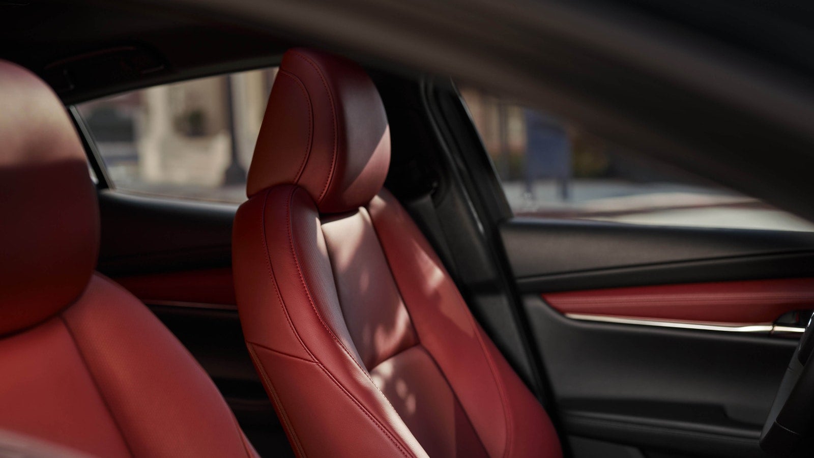 Available red leather inside the 2026 Mazda3 Hatchback near Canton