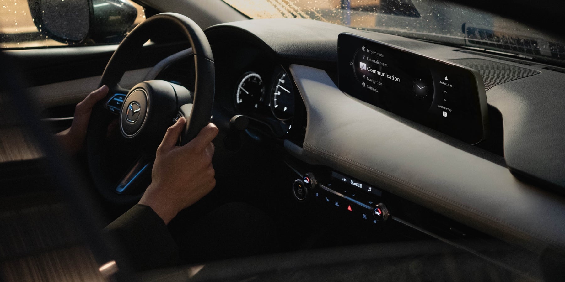 Steering wheel inside the 2025 Mazda3 in Dover, OH