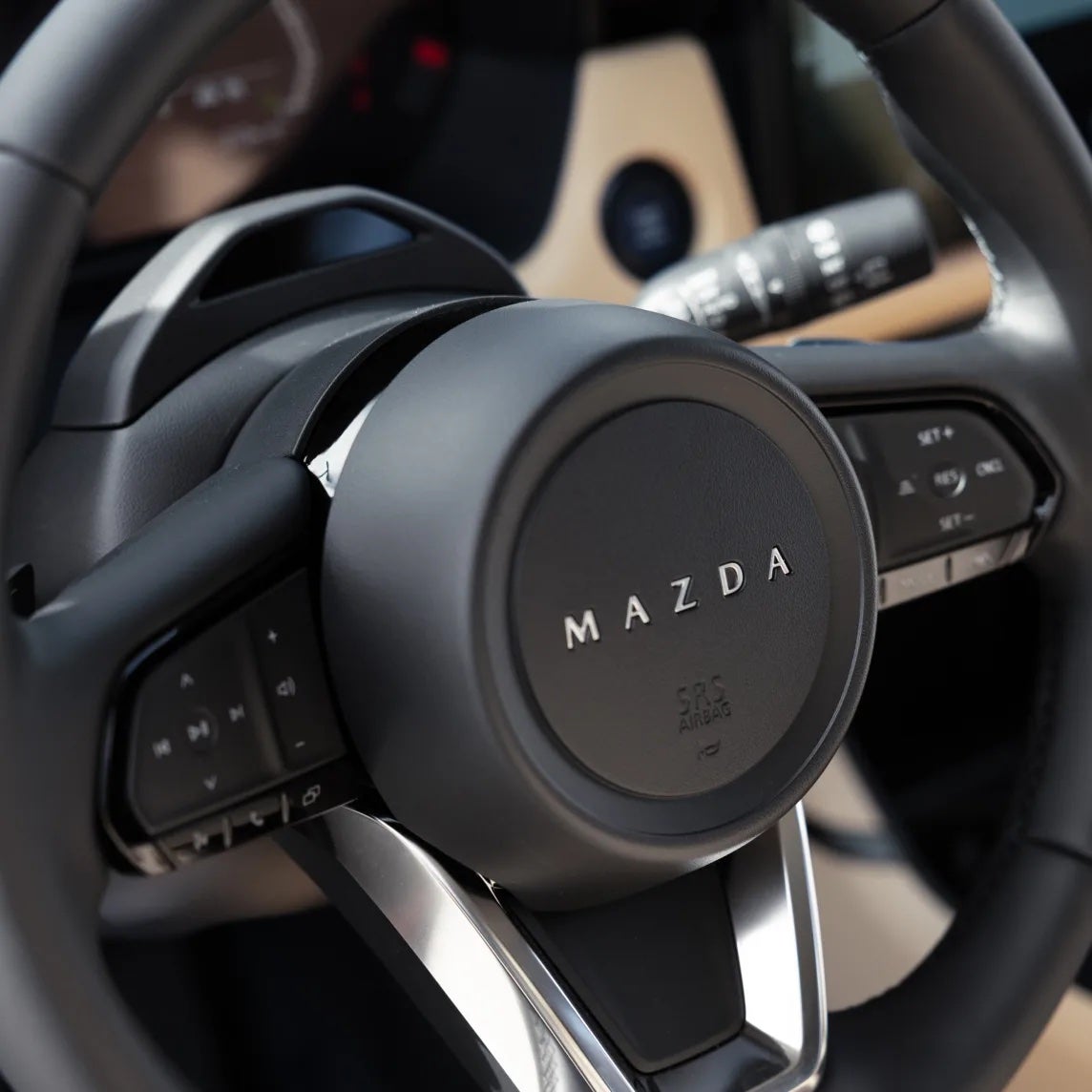 Steering wheel inside the 2026 MAZDA CX-5 near Canton, OH